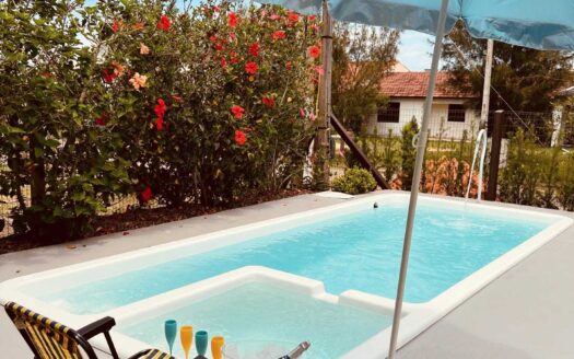 Casa na Praia Real com 3 dormitórios